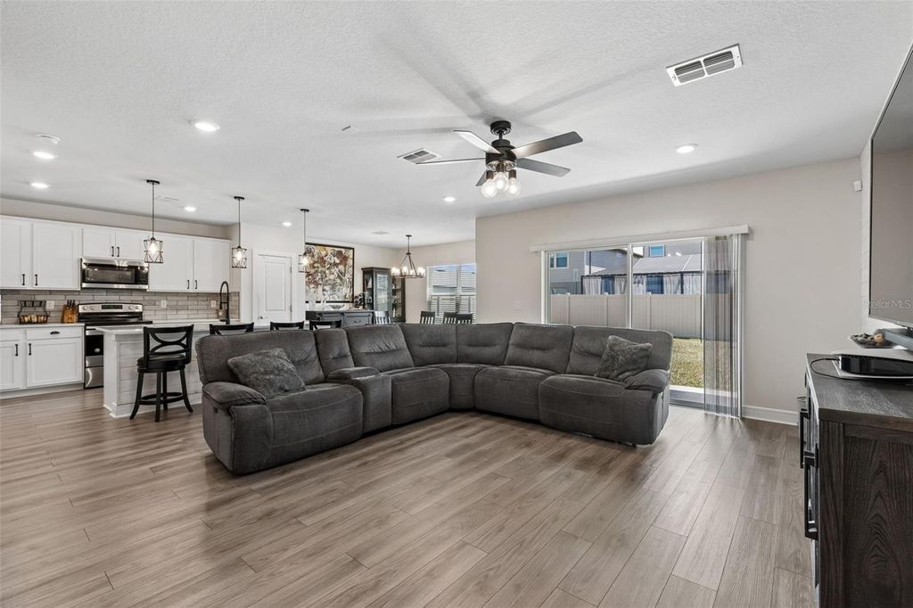 Photo of 6608 Ryestone Way, Wesley Chapel, FL 33545 (MLS # TB8500042)