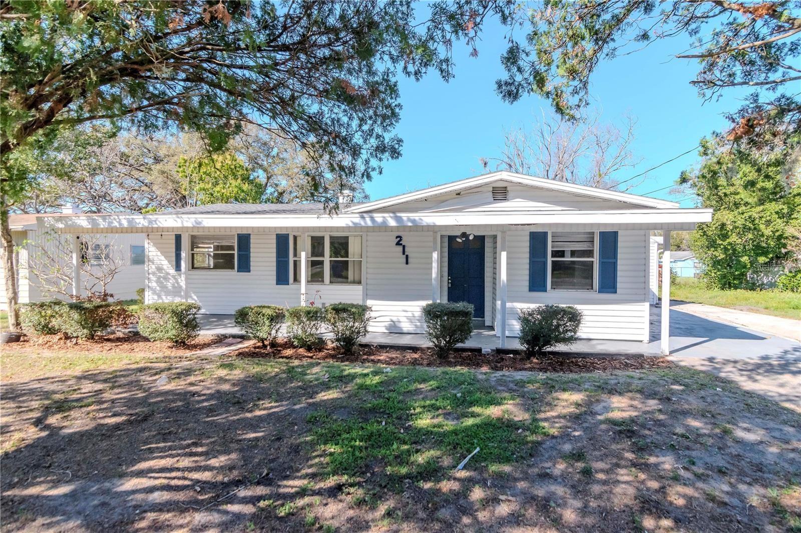 Perfect opportunity for home ownership in the established neighborhood of Valencia Heights. This 2 bedroom, 2 bathroom home is as cute as a button and has so much potential for the right buyer. Almost 1700 square feet gives you a family room with lots of interesting nooks and a dedicated space for an electric fireplace. The kitchen offers a view out the side window and has charming cabinetry that looks like some of it may be original to the year built of 1954. Quaint and casual dining room, right off the kitchen, gives the perfect spot for morning coffee or a create a working space. Alterations have been made over the years and the result is a sprawling floorplan with lots of options. Nice sized primary suite with en suite bathroom & walk in closet. The secondary bedroom, a full hall bathroom, an indoor utility space PLUS a bonus room and an enclosed back room with added storage. There is a concrete pad in the back for BBQ area or bring in a workshop. No HOA here to worry about and the location is just off of 98, within walking distance to Lake Parker or Tigertown. Easy commute to Polk Pkwy or I-4. Close to restaurants, retail and schools. It's good to be home.