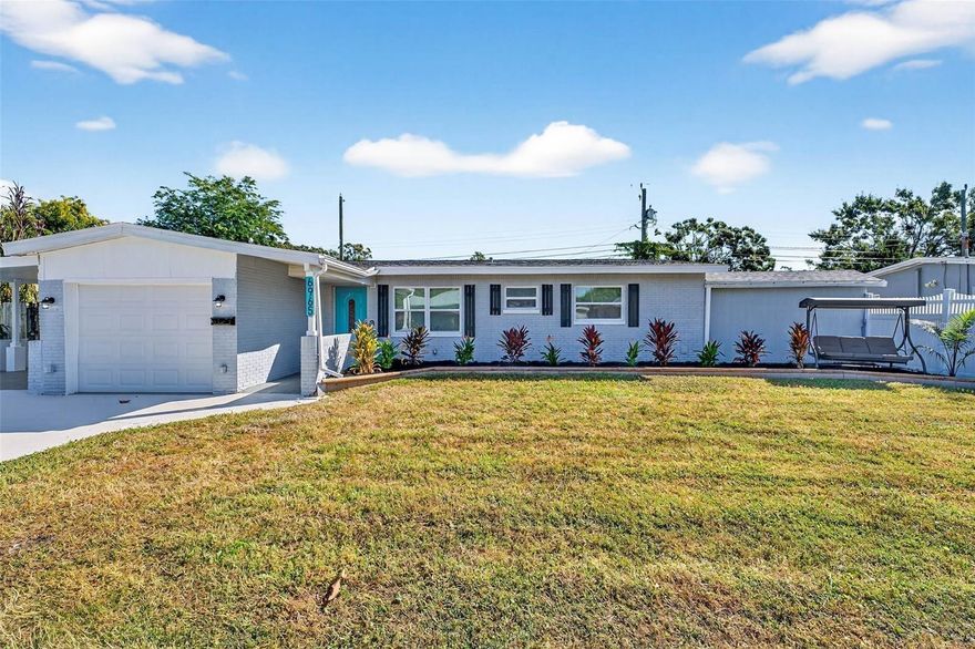 3 bedrooms, 2 full baths, BONUS home office a 1-car garage, and a covered carport. The third bedroom includes a cozy fireplace, perfect for added comfort and charm. Major upgrades include a BRAND-NEW ROOF (2025), BRAND NEW AC (2025), BRAND NEW WATER HEATER (2025). BRAND NEW WINDOWS, BRAND NEW GARAGE DOOR, BRAND NEW SHAKER KITCHEN CABINETS, BRAND NEW QUARTZ COUNTERTOPS, BRAND NEW STAINLESS STEEL APPLIANCES, BRAND NEW LUXURY VYNAL PLANK FLOORING, BRAND NEW BATHROOMS, BRAN NEW FANS AND LIGHTING THROUGHOUT, BRAND NEW LANDSCAPING The property also offers a fully fenced backyard, screened deck porch, and a great BBQ space—ideal for relaxing or entertaining. NO FLOOD ZONE and NO HOA.