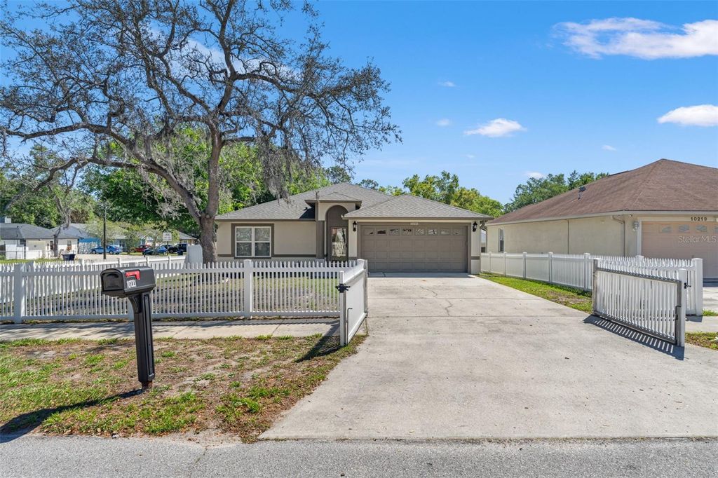 Photo of 10221 N Woodmere Road, Tampa, FL 33617 (MLS # TB8490402)