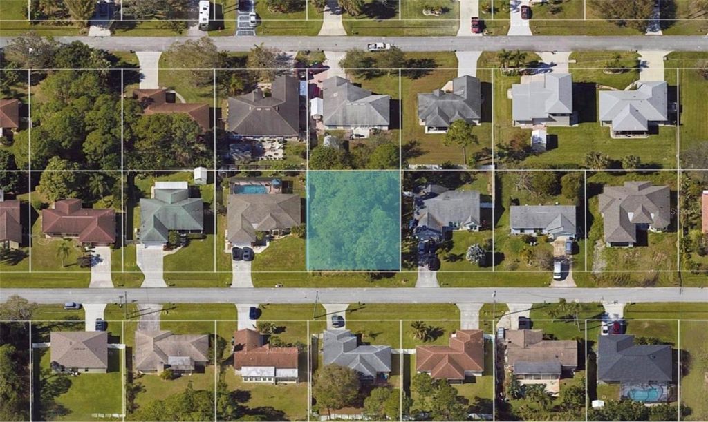 Photo of 552 NW Grenada Street, Port Saint Lucie, FL 34983 (MLS # TB8481491)