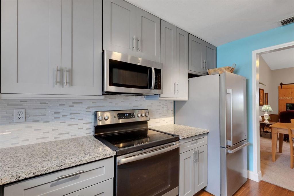 Photo of 1065 Tartan Drive #C, Palm Harbor, FL 34684 (MLS # TB8435267)