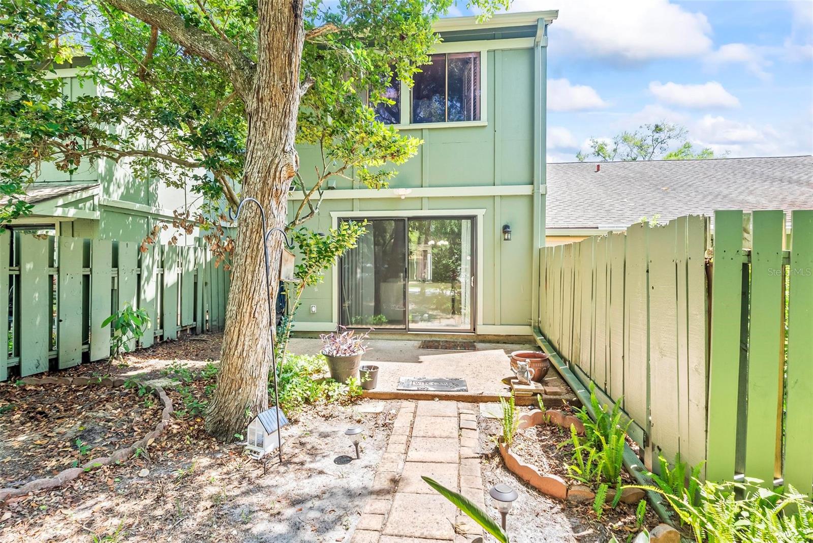 Price Improved to Reflect ''As Is'' Condition - Add Your Personal Touch! This 2-bedroom, 2.5-bath, 1,660 sq. ft. townhome in the sought-after Trails subdivision offers exceptional value and the chance to make it your own. The open layout features a breakfast bar, dining area, family/sitting room, and living room, plus a cozy private patio for outdoor relaxation. Upstairs, the spacious primary suite includes ample closet space and an en-suite bath, while the guest bedroom also has an attached bath. Enjoy community amenities like an Olympic-sized pool, clubhouse, tennis and pickleball courts, racquetball, scenic walking/biking trails, and nearby parks. Convenient to shopping, top-rated schools, and major highways, this home blends location, lifestyle, and opportunity.