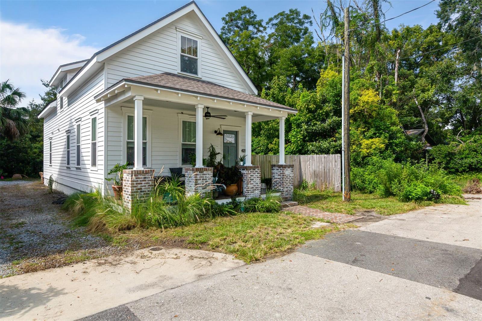 Built in 2023, this stunning four-bedroom, two-and-a-half-bathroom home is perfectly situated between downtown Gainesville and the University of Florida, in the historic and upcoming Pleasant Street neighborhood. Step inside to an open floor plan filled with natural light from large windows, complemented by stylish laminate flooring throughout the living areas. The main floor features a spacious owner’s suite with a walk-in closet and a luxurious shower, as well as a separate laundry room and a convenient half bath. The modern kitchen is a chef’s dream, boasting upgraded appliances, granite countertops, and solid wood cabinets. Upstairs, you’ll find three bright bedrooms with generous closet space and a well-appointed full bathroom. Beautiful tile floors grace each bathroom, adding to the home’s refined style.
