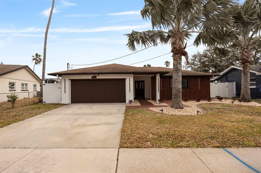 Welcome to the highly desirable Shore Acres neighborhood, where location meets opportunity. This 3-bedroom, 2-bath, 2-car garage home offers the perfect chance to renovate, reimagine, or build new in one of St. Petersburg’s most sought-after communities. Professionally remediated following Hurricane Helene, the property provides a clean, ready-to-customize canvas for your vision.

The backyard is designed for true Florida living. Enjoy a stunning custom saltwater pool complete with an oversized spa, fiber optic lighting, a swim shelf, and built-in perimeter seating — ideal for hosting gatherings or relaxing in your own private retreat. The expansive deck features elegant 2" pavers and a pergola with a natural gas connection, perfectly positioned for a future outdoor kitchen or grill station.

Inside, the split-bedroom layout offers privacy and functionality, enhanced by plantation shutters, double-pane windows, and hurricane-impact sliding glass doors. A covered and screened rear porch extends your living space and creates the perfect spot to enjoy warm coastal breezes year-round.

Conveniently located just minutes from beaches, golf courses, shopping, dining, and with easy interstate access for commuting, this property presents an exceptional opportunity in a premier waterfront community. Bring your vision and make it your own!