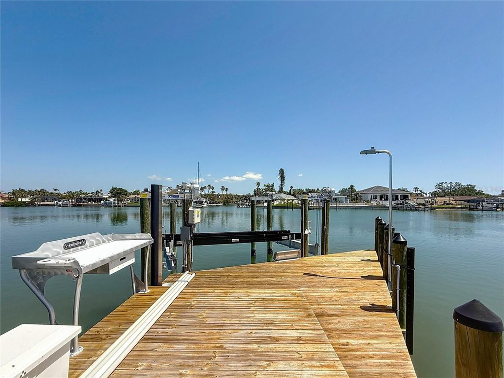 Photo of 240 N Julia Circle, St Pete Beach, FL 33706 (MLS # U8240811)