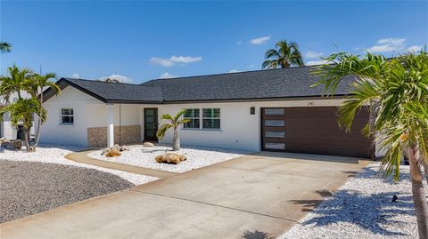 Photo of 240 N Julia Circle, St Pete Beach, FL 33706 (MLS # U8240811)