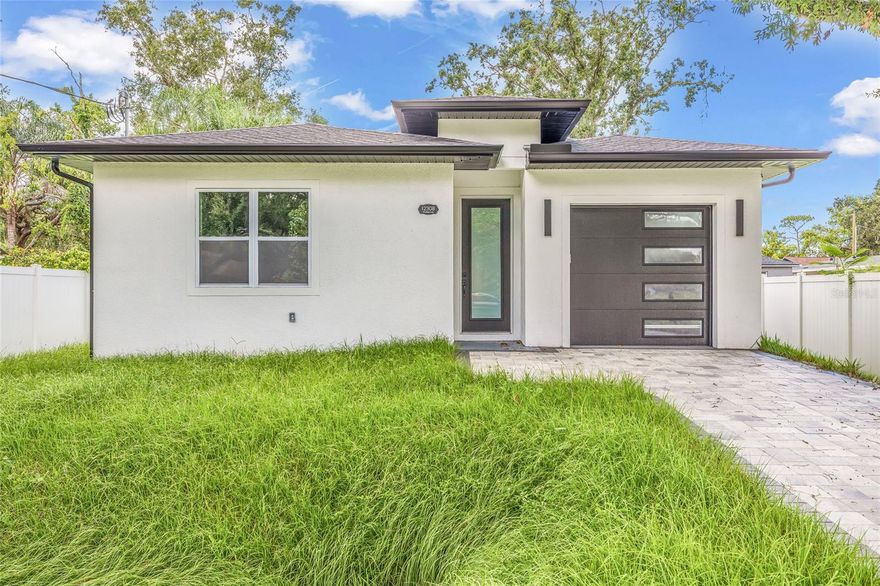 Drastic Price Reduction! Be the First to Own This Gorgeous New Construction Home in Carrollwood! Step into luxury with this beautifully crafted 3-bedroom, 2-bath residence offering 1,991 square feet of thoughtfully designed living space. Nestled in one of Carrollwood’s neighborhoods, this brand-new home showcases high-end finishes, an open-concept layout, and modern style throughout. Enjoy spacious bedrooms, a sleek gourmet kitchen, and elegant bathrooms—all just minutes from shopping, dining, parks, and top-rated schools. With its unbeatable location and attention to detail, this home perfectly blends comfort, convenience, and contemporary living. Don't miss this rare opportunity—schedule your private showing today!
