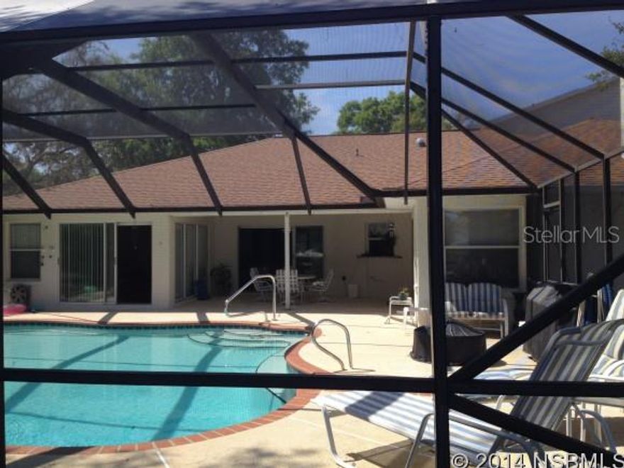 Luxury Living in the Much Desired Spruce Creek Fly Inn. This Gorgeous Bank Owned Custom Home with a Spectacular Runway View from the In-ground Heated & Screened Pool, Oversized Garage with a Private Airplane Hanger (44X38) including an air conditioned (11X14) Pilots Lounge, Golf Cart Storage,  RV Boat Parking/Storage, Fire Place, Well Irrigation Sprinkler System, & Screened Porch Surround yourself with Multimillion Dollar Homes in this Port Orange Gated Community! 4000' paved runway w/GPS approach & VASI lights; 24/7 roving security. ;Water: City