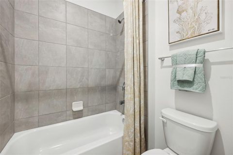 Tiny photo for 12879 Trovita Drive, Grand Island, FL 32735 (MLS # O6409274)