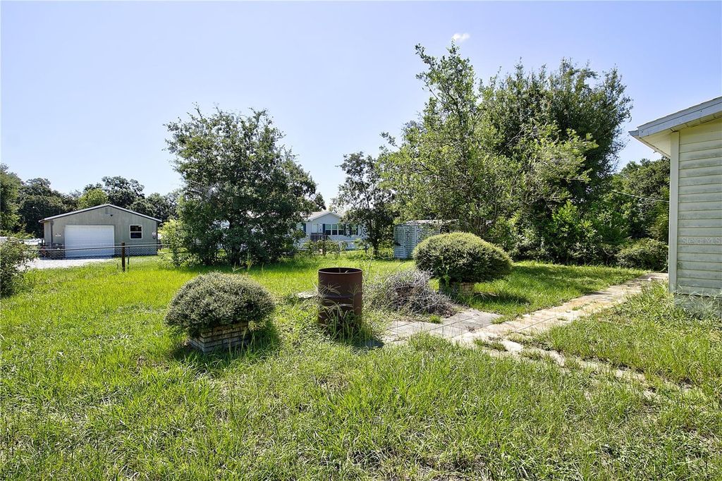 Photo of 9610 Silverbend Drive, Dade City, FL 33525 (MLS # TB8411373)