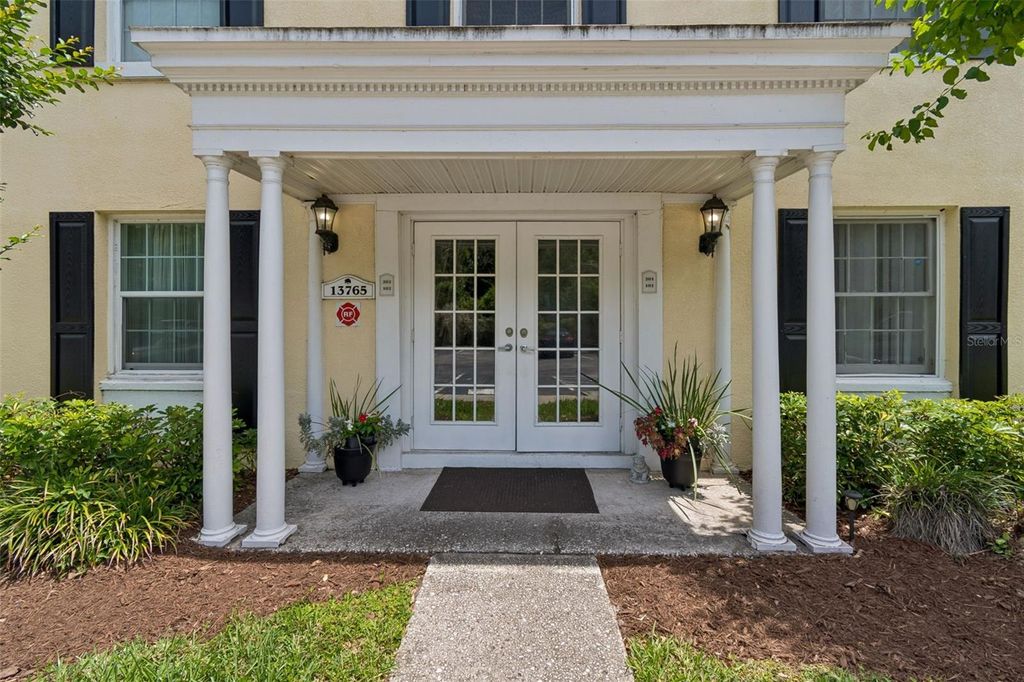 Photo of 13765 Juniper Blossom Drive #101, Tampa, FL 33618 (MLS # TB8498119)