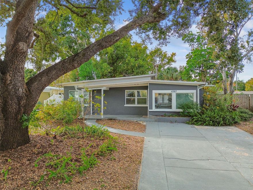 Welcome to this beautifully updated and thoughtfully redesigned home in the heart of South Tampa. This Mid-Century Modern gem combines timeless architectural character with contemporary finishes that stayed high and dry during 2024.
Step inside to a bright and open floor plan-the updated kitchen features stainless steel appliances, a breakfast bar, updated cabinets, and plenty of storage and counter space.  It opens to a large living and dining area that is perfect for everyday living and entertaining.
The spacious primary suite complemented by a fully remodeled en-suite bath with a double vanity and step in shower. All bedrooms are generously sized with ample closet space. Newer luxury vinyl flooring, fresh paint, updated light fixtures, and modern finishes complete this fantastic home.
The fenced backyard with a patio is ideal for year-round entertaining, plus there’s an oversized storage shed for extra space. 
Notable upgrades include a newer roof and HVAC system making this home move-in ready and offering peace of mind. Walk to Foster Park, Anderson Elementary, or Adum K-8 Magnet School.  Home did not experience any flooding in hurricanes Helene or Milton.