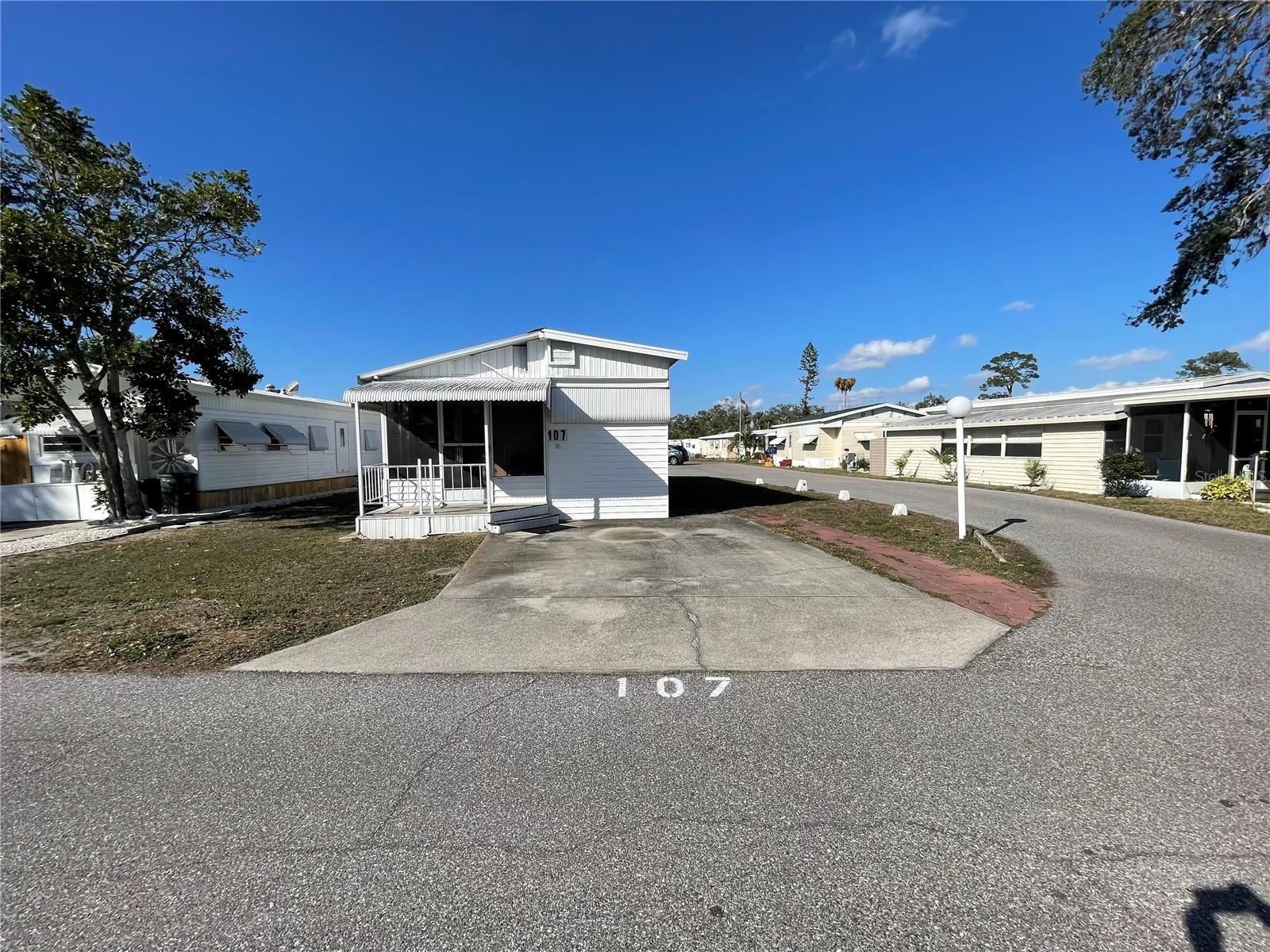 Welcome to the Gulf Of Manatee, this home in Sugar Creek Estates is clean and ready for a new owner. Nice utility room with washer and dryer. Nice size kitchen and dining room area with a huge living room. This corner lot is right next to all the amenities and gives you extra parking for visitors. About 13 miles to the beaches. Home perfect for snowbirds or full-time residence. Low HOA fees include Internet & cable, trash, water & sewer, activities, a heated pool, shuffleboard and park maintance fees. HOA requires 750 credit score and background check. BUYER TO EXERCISE DUE DILIGENCE. BUYER TO CONFIRM MLS DATA.