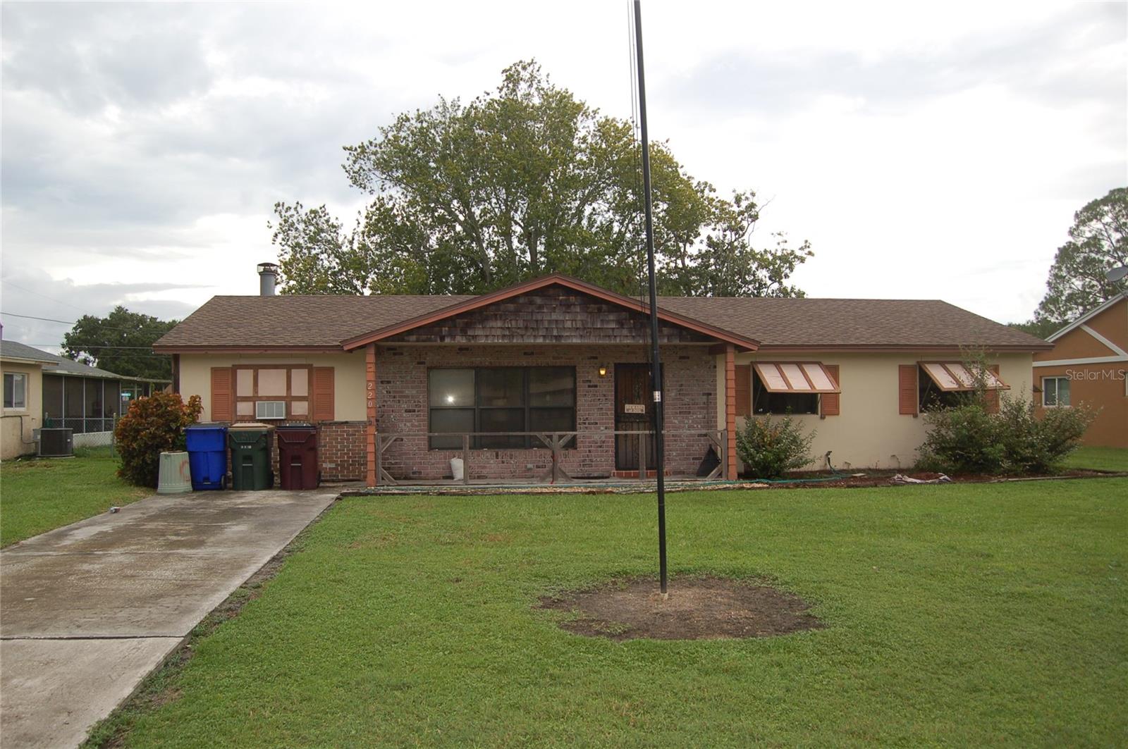 2 Blocks from East Lake Toho!!! Here is your chance to own almost a quarter acre with no HOA or CDD in the heart of St Cloud. This 3 bed/2 bath home is ready for someone to see the potential and make it your own. It features a new roof (2024). A totally fenced in back yard with plenty of room to entertain family and friends! Don't hesitate to schedule your showing today!