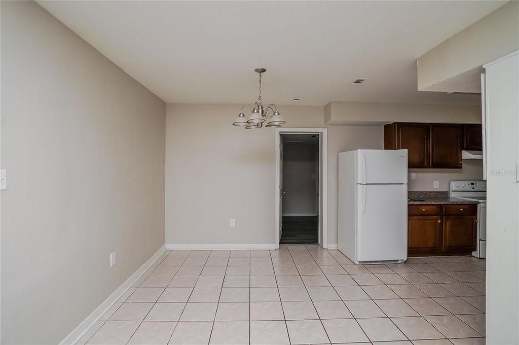 Photo of 6129 Hialeah Street, Orlando, FL 32808 (MLS # TB8436318)