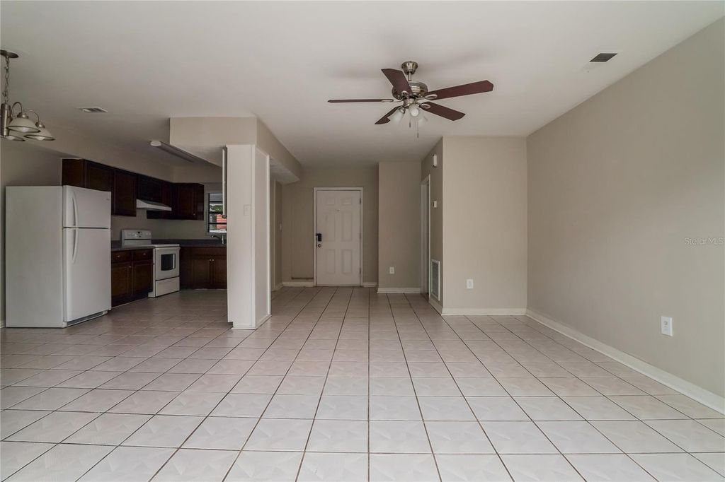 Photo of 6129 Hialeah Street, Orlando, FL 32808 (MLS # TB8436318)