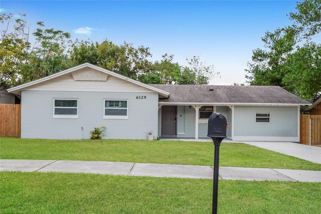 Photo of 6129 Hialeah Street, Orlando, FL 32808 (MLS # TB8436318)