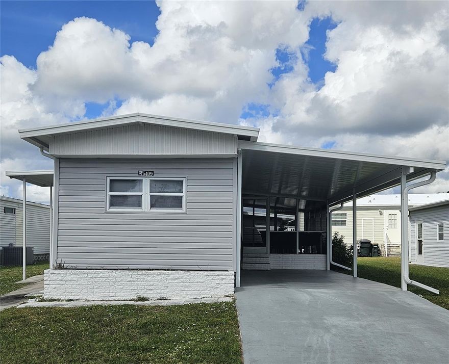 Welcome to Holiday Park! This turn-key furnished LAND-OWNED renovated 
manufactured home offers 2 bedrooms and 1 bathroom with a new carport (2023) 
large enough for two vehicles! Holiday Park is an extremely active 55+ gated 
community loaded with amenities while still maintaining an affordable HOA fee. 
Amenities include two clubhouses, two community pools, fitness center, beautiful 
park with lake & Gazebo, tennis courts, pickleball courts, bocce ball courts, 
shuffleboard, horseshoe pits, ping pong tables, billiards, library, card room, and 
dart boards! And it's a golf cart friendly community! As you walk through the front 
door of your new home you'll immediately notice the brand-new vinyl plank flooring 
throughout, including the bedrooms! Your new home features an open, light & 
bright floorplan with new impact windows throughout (2020)! The eat-in kitchen 
cohesively flows into the spacious living room. The two bedrooms are privately 
nestled in the rear of the home with the bathroom in between. Enjoy your morning 
coffee or evening cocktail in the huge lanai rebuilt in 2017! Recent updates include 
new A/C (2017), new moisture barrier, insulation, and extra support pillars 
underneath the coach (2018), interior paint (2020), remodeled kitchen with 
quartzite counters and new stainless appliances (2020), new vinyl siding (2020), new 
front covered porch (2024). Lastly, there is a convenient workshop/storage shed off 
the carport that includes a new washer and dryer (2020). Easy access to US-41 
where you'll find countless restaurants, shopping centers, and near the beach! If all 
of that weren't enough, enjoy a ball game at the Tampa Bay Rays state-of-the-art 
training camp facility only 5 miles away!