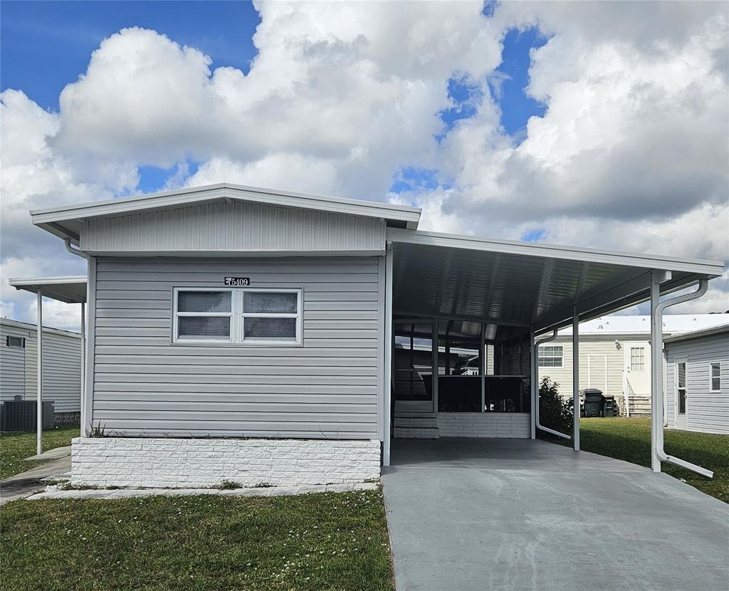 Photo of 5409 Holiday Park Boulevard, North Port, FL 34287 (MLS # C7519853)