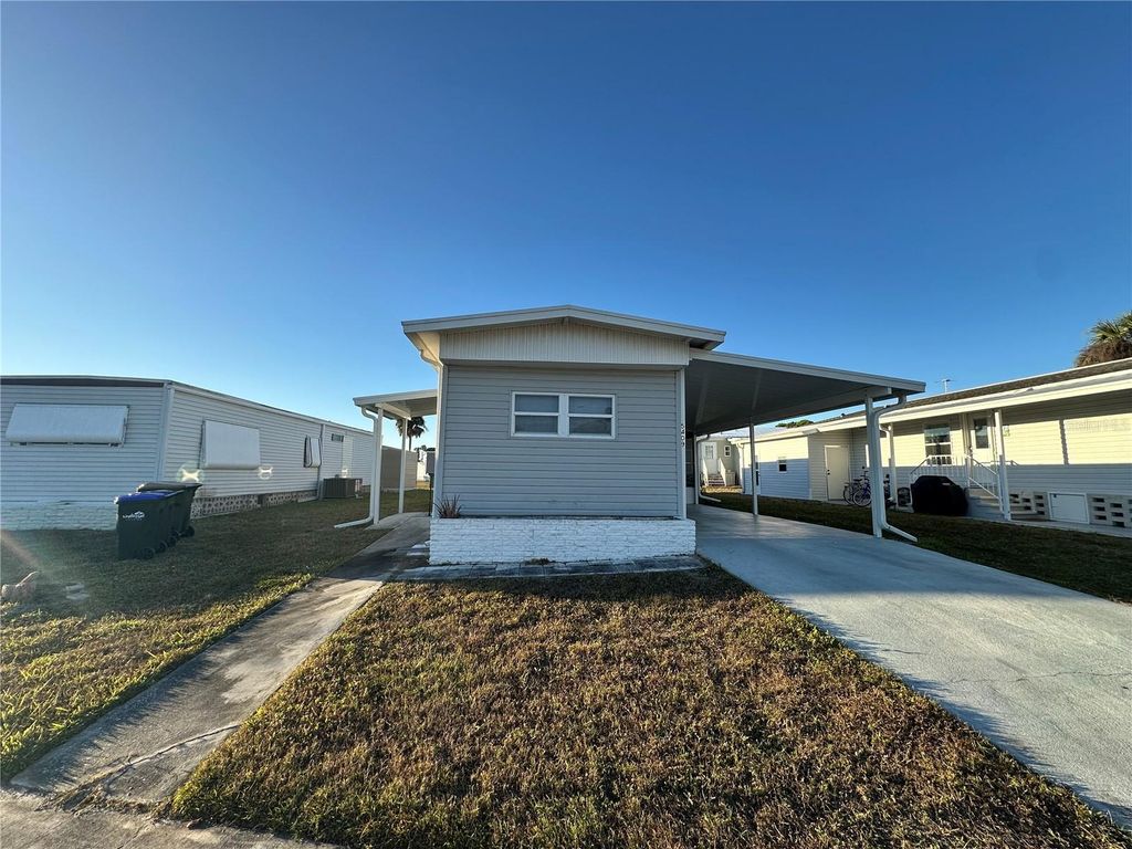 Photo of 5409 Holiday Park Boulevard, North Port, FL 34287 (MLS # C7519853)