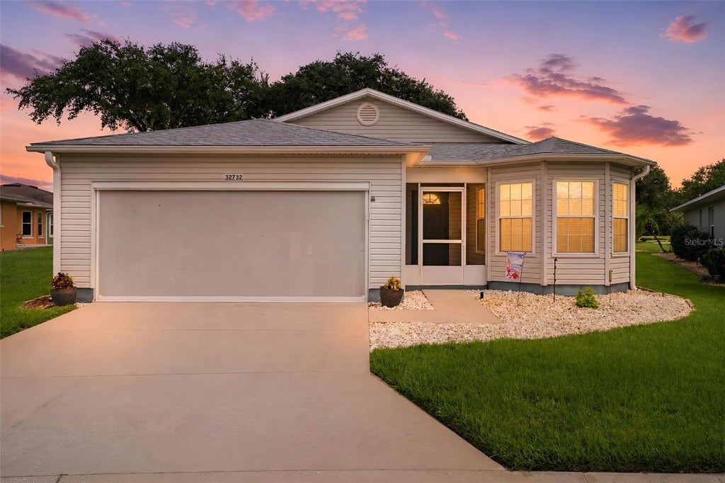 Photo of 32732 Timberwood Drive, Leesburg, FL 34748 (MLS # G5117474)