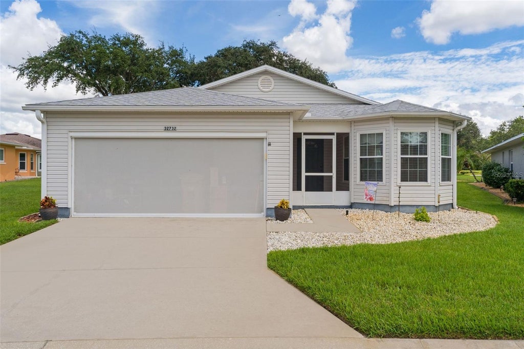 Photo of 32732 Timberwood Drive, Leesburg, FL 34748 (MLS # G5117474)