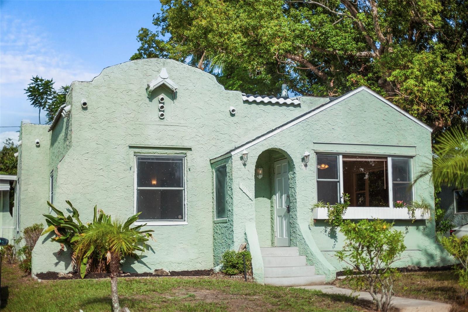 Charming Mediterranean style home located in the City Limits of Beautiful Clermont featuring 2 bedroom/1 bath, original hardwood floors and open floor plan. Enter into the beautiful sun/Florida room which can be used as den, office or bonus room. Recently renovated kitchen. Large screened rear patio perfect for outside dining and entertaining. Electrical update 2024; New AC 2022; New roof on rear building 2025. Main house roof recover 2022.