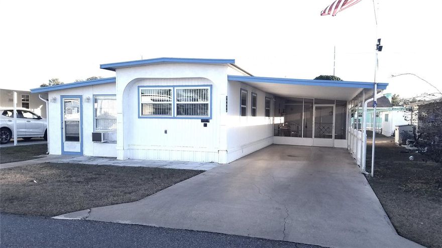 MOVE-IN READY!! LOOKING FOR AN UPDATED STARTER HOME FOR ONLY $72,500? Come and see this 2-bedroom, 1 bath home with completely remodeled kitchen and bathroom in 2023.  LOW MONTHLY HOA FEES only $120 a month for a POOL COMMUNITY!  This nicely updated singlewide home offers a cozy yet spacious layout with modern kitchen cabinets and new bathroom updated with easy get in shower.
The bonus room offers extra living space currently set up as a cozy living room with a couch that turns into a bed along with other furniture, that's an extra 240 sq. ft of living area as well as a screened porch on the other side of the home giving you another 240 sq ft of living area for a total of 1,164 sq ft of living area making use of all the space.  The spacious shed holds the washer & dryer and all of your extra things. Located in the 55+ Sleepy Hollow Community you will enjoy a sparkling pool, clubhouse, social activities or just relax.  You own the share (valued at $62,000) and the home (land & home) for $72,500. You are minutes from medical, dining, shopping facilities.  Call to view this home to see if it would work for you as a winder get-a-way or an all year home where you feel safe, with a friendly community for only $120 a month for the HOA fee.