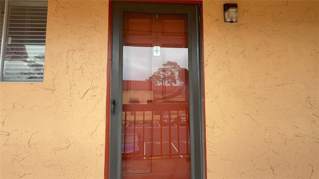 Photo of 2800 N Powers Drive #9, Orlando, FL 32818 (MLS # O6397365)