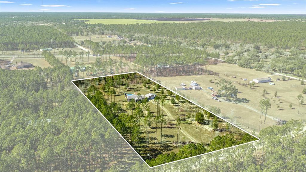 Photo of 5130 SE 137th Avenue, Morriston, FL 32668 (MLS # OM717876)