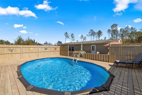 Tiny photo for 5130 SE 137th Avenue, Morriston, FL 32668 (MLS # OM717876)