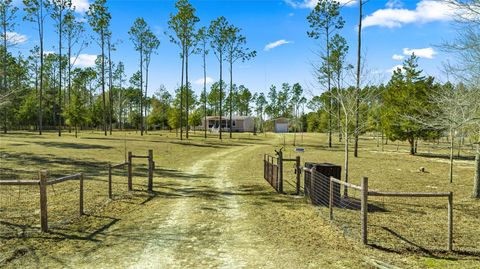 Photo of 5130 SE 137th Avenue, Morriston, FL 32668 (MLS # OM717876)