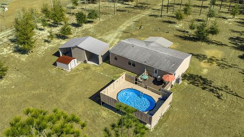 Tiny photo for 5130 SE 137th Avenue, Morriston, FL 32668 (MLS # OM717876)