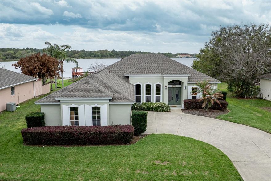 Waterfront Living on Lake Idamere – Sunsets Included! SELLER OFFERING OWNER FINANCING/CONTRACT FOR DEED - 10% down - 4.99% interest rate!

Welcome to 3804 Bayshore Circle, a beautifully situated waterfront home on the peaceful shores of Lake Idamere in Tavares. Tucked away in an amazingly quiet setting yet close to everything, this highly sought-after location offers the best of both worlds. Enjoy a low HOA of just $35 per month, which includes access to a community boat ramp and dock—perfect for embracing lake life.

Set on an oversized lot, this home delivers breathtaking sunset views every evening, with no two ever the same. Built in 2004, the home features 1,908 heated square feet, a desirable split floor plan, 3 bedrooms, 2 bathrooms, and a rare 3-car garage—an exceptional find for the area.

Major updates provide peace of mind, including a new roof (January 2024), new HVAC system (November 2025), fresh interior paint throughout (February 2026), and beautiful new luxury vinyl flooring (February 2026), creating a move-in-ready feel while maintaining the home's comfortable charm.

Inside, the thoughtfully designed layout immediately welcomes you with soaring ceilings and an abundance of natural light. Upon entry, the den sits to your right—ideal for a home office or flex space—while the formal dining room is positioned to the left, perfect for gatherings and special occasions. Straight ahead, the living room draws your eye to stunning lake views that anchor the heart of the home.

Just off the living room, the kitchen and dinette area offer generous counter space, ample cabinetry, a pantry, and—yes—another beautiful view of the water. Enjoy casual meals at the breakfast table or additional seating at the bar, making this space both functional and inviting.

The primary suite is privately located off the living room and features tranquil water views through charming bay windows, creating the perfect nook for a sitting area where you can read, relax, and soak in the scenery.

Lake County living truly shines here, with nearby waterfront downtowns, festivals, arts and crafts shows, and beloved mom-and-pop restaurants that each offer something unique and delicious. You’re also conveniently close to major highways, hospitals, and shopping.

The current owners’ plans have changed and they will no longer be relocating to Florida, creating an opportunity for a new owner to enjoy this beautiful waterfront property.

Don’t let this one pass you by... you have been given a second chance! All new furnishings onsite are included with the sale.

All information recorded in the MLS is intended to be accurate; however, it should be independently verified by the buyer and their agent. Check out the Virtual Tour!