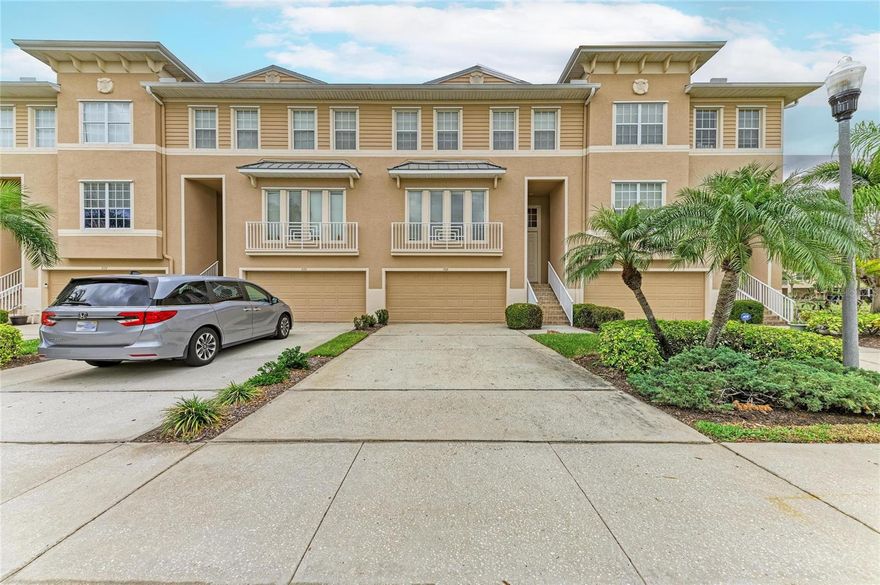 One or more photo(s) has been virtually staged. Experience the quintessential Florida lifestyle in this exceptional 3-bedroom, 2.5-bath townhome, offering 2,088 square feet of thoughtfully designed living space in the prestigious Seminole Isle community. Situated just steps from serene water access along Long Bayou, this residence remained completely unaffected by recent storm-related flooding, providing peace of mind and resilience in a prime location.The open-concept main level features a spacious living room seamlessly connected to an expansive gourmet kitchen equipped with granite countertops, a central island,  appliances, ample pantry storage, and a convenient workstation—ideal for culinary enthusiasts and everyday entertaining. A dedicated dining area (or flexible bonus space), powder room, and screened balcony overlooking lush mangroves and the bayou complete the first floor. Step outside to the private first-floor lanai, perfect for outdoor grilling or relaxing amid tropical greenery.An oversized two-car garage offers abundant storage, workspace potential, and room for watersport equipment. Upstairs, engineered wood stairs lead to a versatile loft/flex space—perfect for a home office, study, or playroom—alongside the generous master suite and two additional bright guest bedrooms sharing a well-appointed full bath. The primary bedroom measures an impressive 19' x 15', accommodating large furniture and a cozy reading nook. The luxurious ensuite bath includes French doors, a deep soaking tub, dual vanities, a separate shower, private water closet, and an expansive walk-in closet.Additional highlights include impact-resistant storm shutters for enhanced protection and insurance savings, as well as gated entry, paved walking paths, and a golf cart-friendly environment.Seminole Isle delivers resort-style amenities year-round: a heated waterfront pool surrounded by palm trees and lake views, screened pavilions for gatherings, a waterside fire pit, kayak storage and launch dock, fishing pier, clubhouse with fitness center, tennis courts, pickleball courts, and more.Conveniently located directly across from Lake Seminole Park—offering trails for running, biking, skating, and boat launching—this community is just 5.4 miles from Gulf beaches, with easy access to Seminole City Center for shopping, dining, and entertainment.This rare opportunity combines spacious luxury, flood-free assurance, and unparalleled amenities in one of Seminole's most sought-after waterfront enclaves.This an outstanding value. unit Schedule your private tour today.  Contact me for details and to arrange a showing.