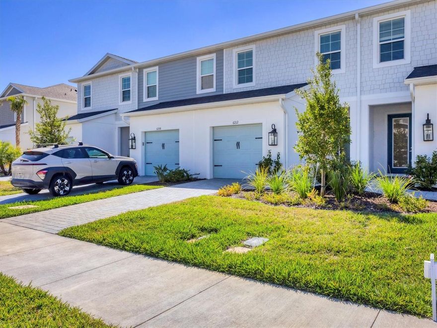 BRAND NEW TOWNHOUSE AVAILABLE FOR ANNUAL LEASE IN THE VIBRANT GRAND PARK COMMUNITY OF SARASOTA!  This spacious townhome boasts three bedrooms and 2.5 bathrooms, offering a perfect blend of comfort and style. The modern open layout features an inviting kitchen with stainless steel appliances and an island that opens to a cozy living area, ideal for gatherings. Enjoy the convenience of an upstairs laundry area and a master bedroom complete with two walk-in closets and a luxurious bathroom featuring double sinks. Grand Park offers resort-style amenities including two community pools, fitness and aerobics studios, playgrounds, tennis and pickleball courts, dog parks, and miles of scenic walking and biking trails. Enjoy Sarasota's world-famous beaches--15-20 minutes' drive to Siesta Beach along with shopping, dining, and entertainment options at UTC and downtown Sarasota. The home also has a two car tandem garage. Basic cable and internet included!
