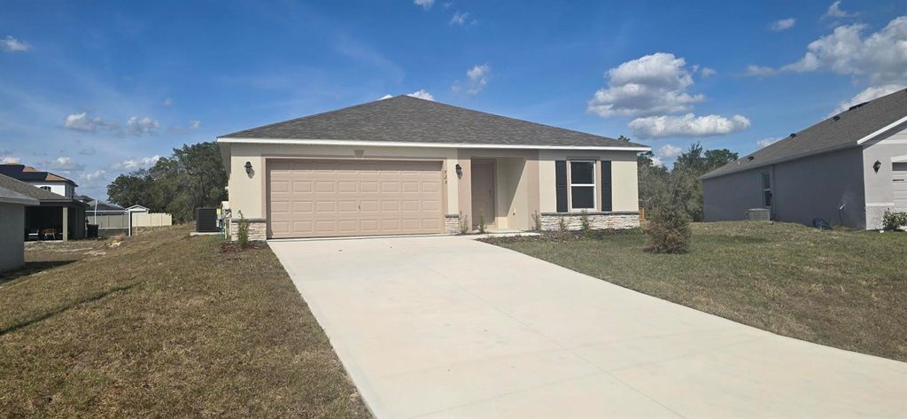 Photo of 1723 Redfin Way, Poinciana, FL 34759 (MLS # C7522392)