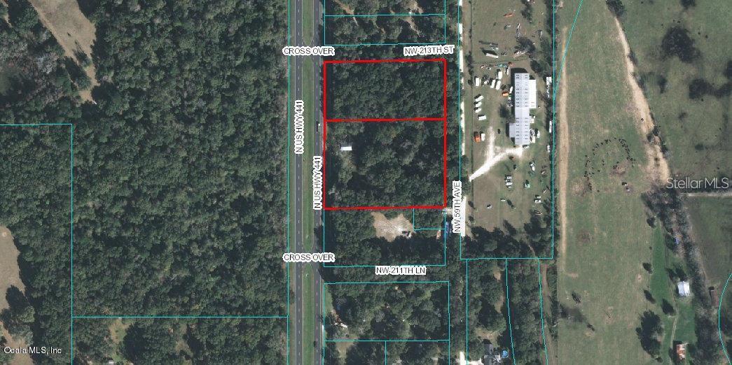 2 adjoining parcels 02307-000-00 & 02308-000-00 totaling 5.37 acres +/-Zoned B-44 Lane Highway Situated between Ocala & Gainesville Curb Cuts north and south of the propertyOld house 1923 no value - uninhabitable in current conditionVerify all acceptable uses with the Marion County Zoning Department