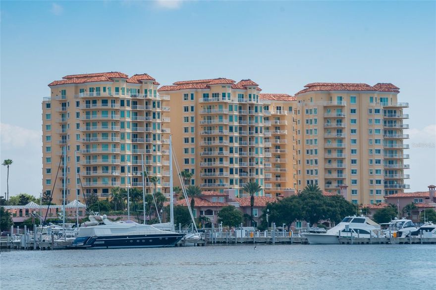 Commanding in scale and rich in potential, this expansive 3,300-square-foot waterfront residence offers a rare opportunity to own a truly grand condominium defined by volume, light, and breathtaking marina views. Thoughtfully positioned to embrace its setting, the home also includes two dedicated parking spaces, one equipped with a dedicated EV charging circuit and the other with a dedicated 20-amp circuit, providing modern convenience and future-forward functionality to complement the residence's impressive scale.

Designed for effortless living and entertaining, the home unfolds with generously proportioned living spaces that flow seamlessly toward the water. The kitchen opens directly into the main living area, allowing uninterrupted sightlines to the marina beyond-so whether you're preparing a morning coffee or hosting an evening gathering, the water remains a constant backdrop.

One of the home's most distinctive features is its four private balconies, each offering a unique vantage point to take in shimmering water views, passing boats, and ever-changing skies. These outdoor extensions create an indoor-outdoor rhythm rarely found in condominium living, ideal for sunrise moments, sunset cocktails, or quiet reflection.

The primary suite is truly oversized, functioning as a private retreat with ample room for a sitting area, workspace, or reading nook. With generous closets and direct access to outdoor space, it offers comfort, privacy, and flexibility-an exceptional foundation for a future spa-inspired sanctuary.

Throughout the residence, the emphasis is on scale, structure, and setting-a timeless architectural footprint that invites personalization. With remarkable square footage, stunning views, and a flowing layout, this home presents a blank canvas for a discerning buyer to tailor a bespoke waterfront residence to their vision.

This is not simply a condominium-it's a statement of space, light, and waterfront living, offering the rare chance to create something truly extraordinary in an irreplaceable setting.