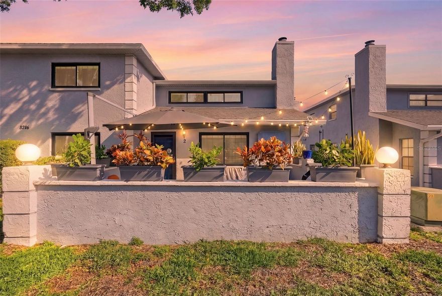 Welcome to this beautifully updated loft style townhome in the desirable Calais Village community of St. Petersburg! This spacious 2 bedroom, 2 bath residence offers a unique open concept layout with soaring ceilings, abundant natural light, and a stylish loft that’s perfect for a home office, guest space, fitness room or additional living area. The home has been thoughtfully enhanced with numerous recent upgrades, including newer hurricane-impact windows and a newer roof for added peace of mind. Inside, you’ll find newer interior paint (2022), updated carpet (2022), and elegant new blinds throughout.

The living room features a freshly painted wood-burning fireplace, creating a warm and inviting focal point, while new ceiling fans in both the living area and loft improve comfort year-round. The staircase has been beautifully modernized with a cable rail system for a more open concept look and carpeted steps (2022), along with a newly installed railing on the opposite side (2026), adding both style and safety.

Enjoy indoor & outdoor living with a patio, ready for your finishing touches to create the perfect private retreat. Additional upgrades include a new glass/screen door (2025) and a brand-new GE washer and dryer (2025) for convenience. The monthly condo association dues provide exceptional value, covering Spectrum cable and internet, also water, sewer, and trash, making for truly low maintenance living. Located in a centrally positioned St. Petersburg community, you’re just minutes from shopping, dining, parks, and a short drive to downtown and the Gulf beaches. This move in ready townhome combines comfort, style, and value.