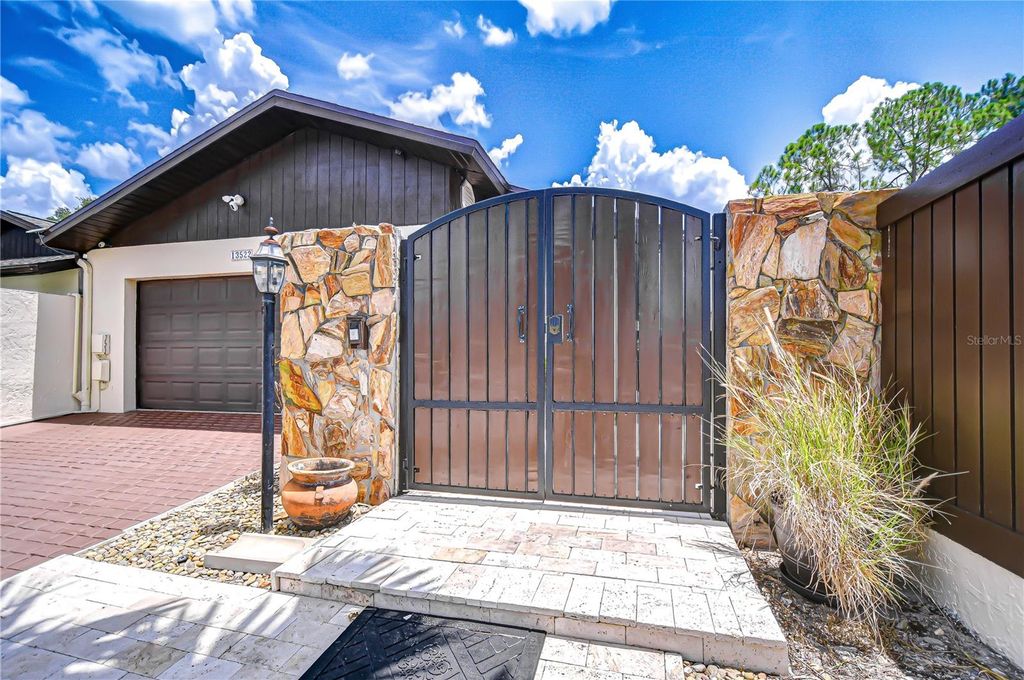 Photo of 13522 Avista Drive, Tampa, FL 33624 (MLS # TB8414839)