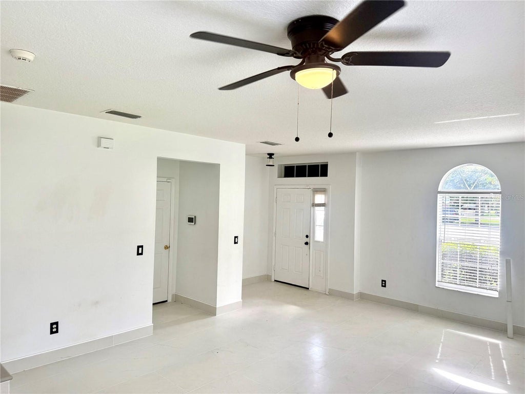 Photo of 1945 Marsh Hawk Dr, Orlando, FL 32837 (MLS # S5157962)