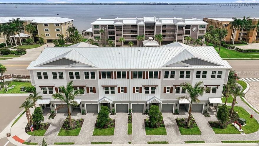 What's Special: New Pricing | Large Kitchen Island | Close to Amenities. New Construction - Ready Now! Built by Taylor Morrison, America's Most Trusted Homebuilder. Welcome to the Miramar at 1624 Compass Pointe Ct Unit 202 in Seahaven. This unit has its own private elevator that runs from the 1st floor in the garage all the way up to the 3rd servicing all floors. Includes appliances, washer dryer, upgraded cabinets, Harbor color. Selected quartz counters in kitchen and baths, tender gray tile backsplash in kitchen, single bowl stainless steel sink, wooded shelving, tile flooring throughout home with upgraded carpet in 3rd floor bedrooms, wall tile to ceiling in all baths and frameless shower enclosures. Structural options include Impact windows, screened balconies, a spacious 1 car garage with storage, plus many more great features. Seahaven offers a community pool, cabanas, and dog park for you to enjoy as well. Additional Highlights Include: Quartz countertops, tile throughout, GE Cafe kitchen appliances, garage with epoxy flooring. Photos are for representative purposes only. MLS#225070995/A4667092