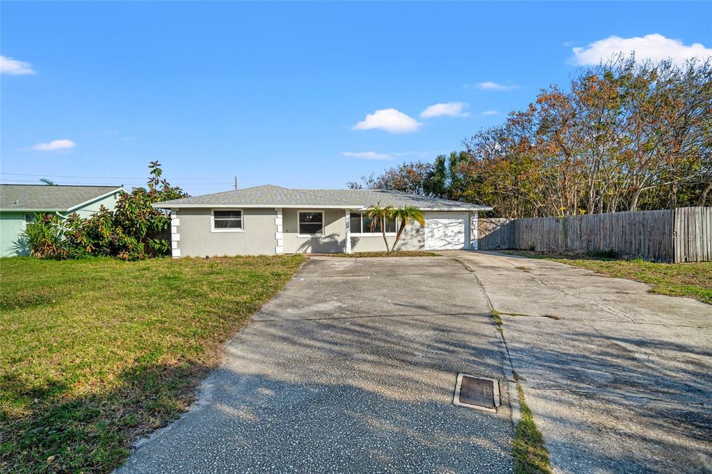 Photo of 8934 Tropical Palm Way, Port Richey, FL 34668 (MLS # T3493868)