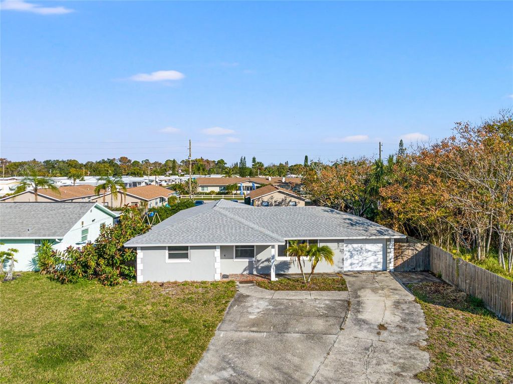Photo of 8934 Tropical Palm Way, Port Richey, FL 34668 (MLS # T3493868)