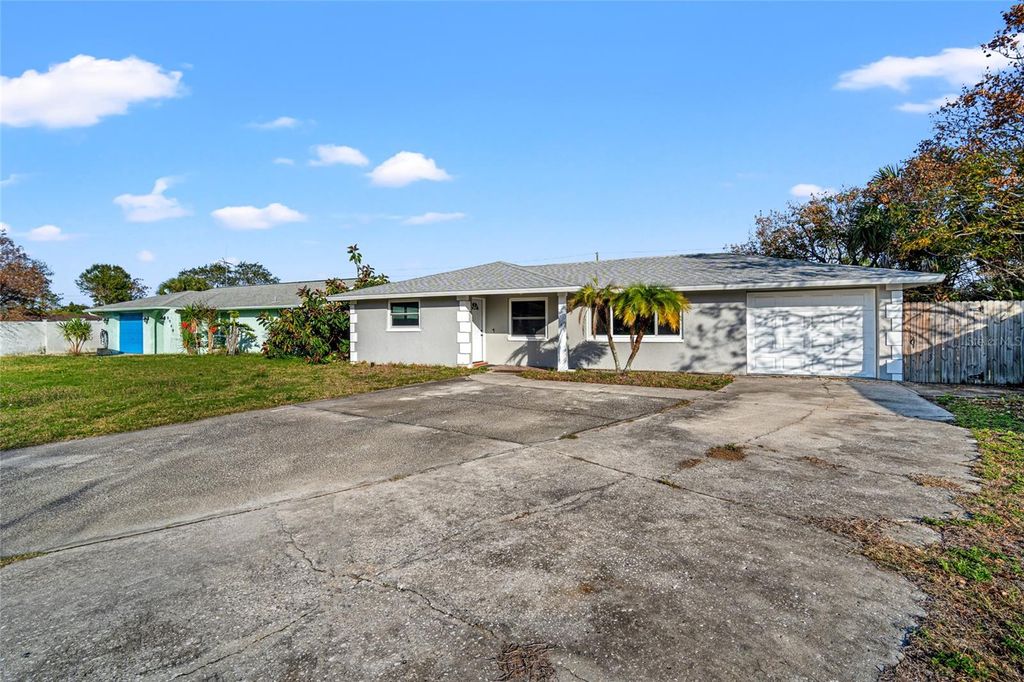 Photo of 8934 Tropical Palm Way, Port Richey, FL 34668 (MLS # T3493868)
