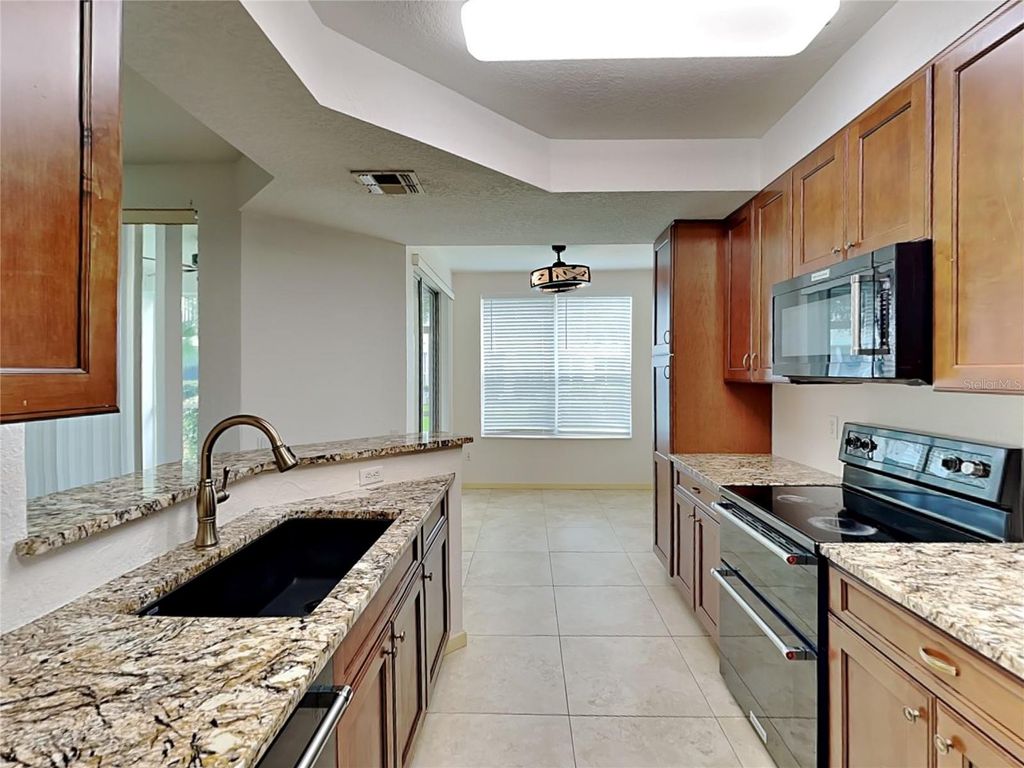 Photo of 5049 Maxon Terrace #103, Sanford, FL 32771 (MLS # O6377305)