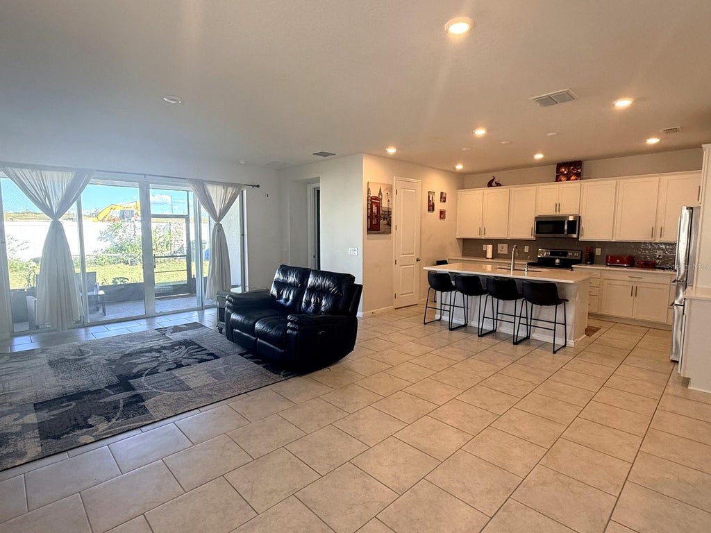Photo of 121 Crestview Lane, Dundee, FL 33838 (MLS # O6453946)