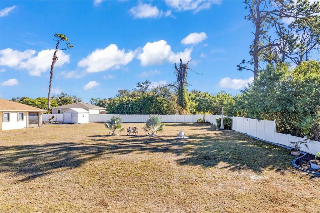 Photo of 2306 Cedarwood Street, Port Charlotte, FL 33948 (MLS # C7525478)